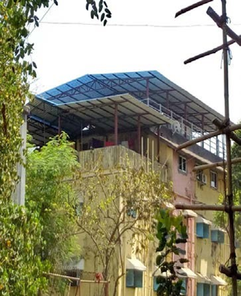 Building Tarries Roof